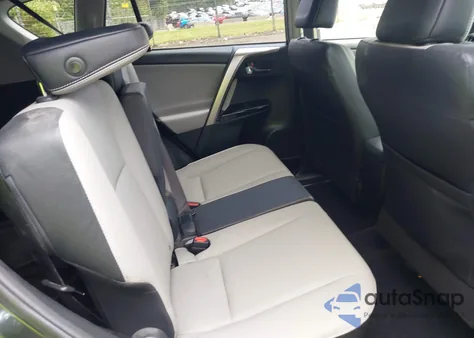 2018 Toyota Rav4 Limited z USA, uszkodzony, nr VIN JTMYFREV9JD127737